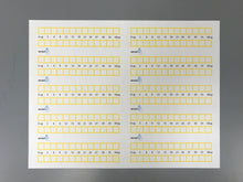 Load image into Gallery viewer, Sheet of titrators (yellow wax, iodine labels, unbaked)