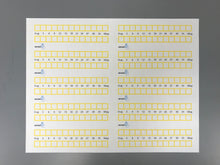 Load image into Gallery viewer, Sheet of titrators (yellow wax, iodine labels, unbaked)
